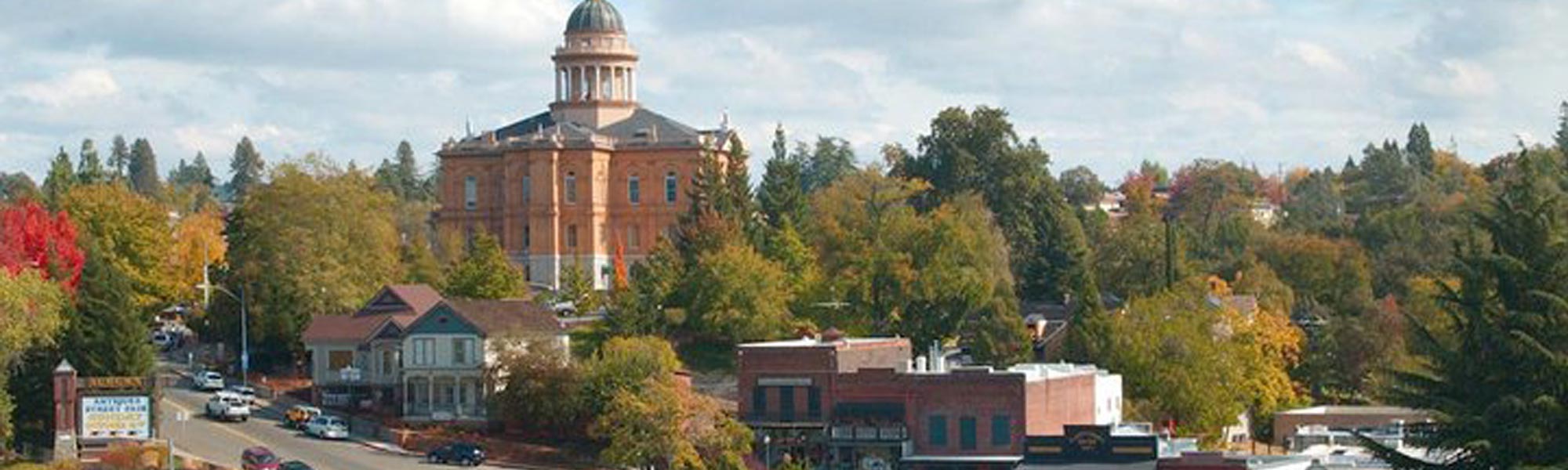 Auburn, California tree line with the city hall building